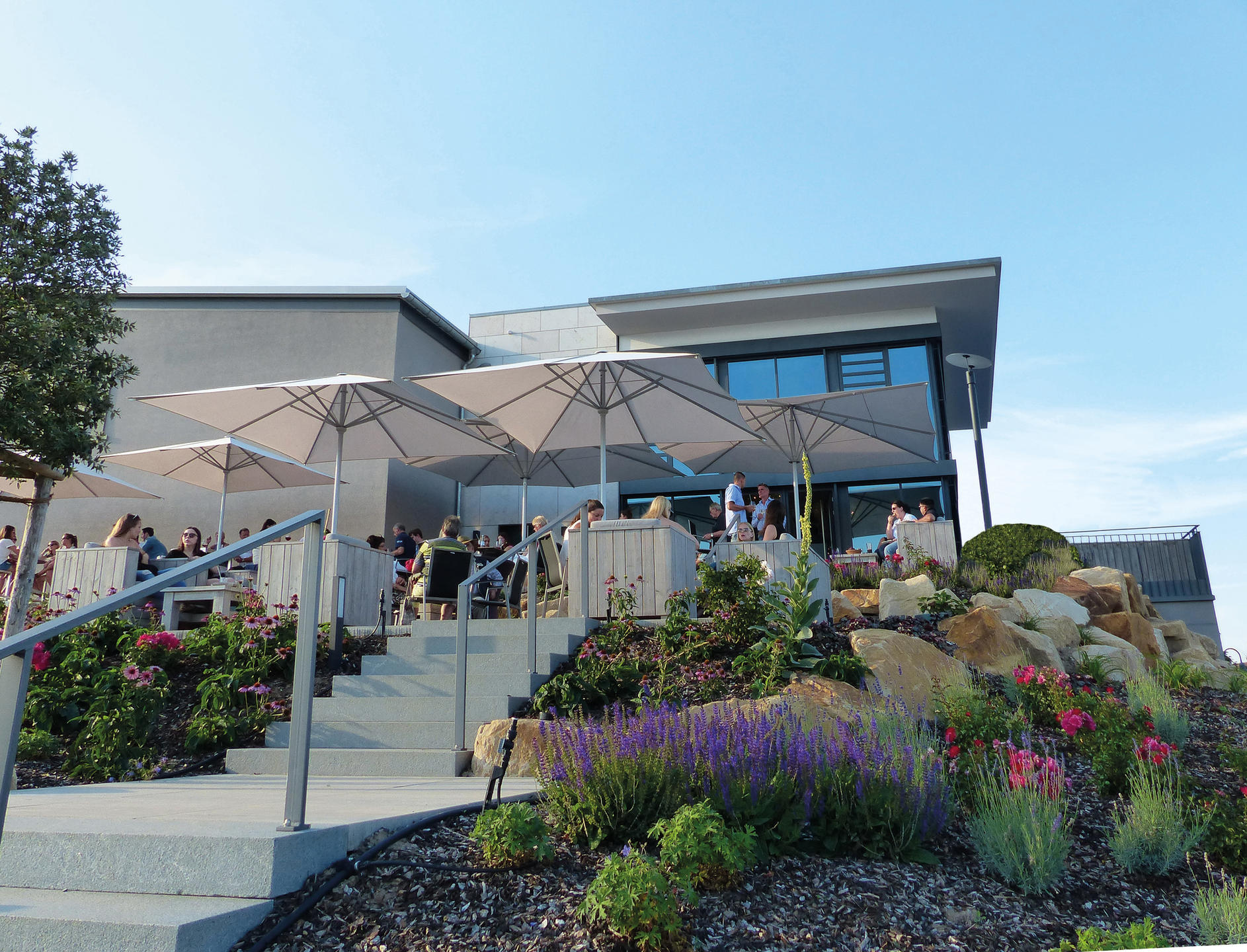 Patio with beige parasols